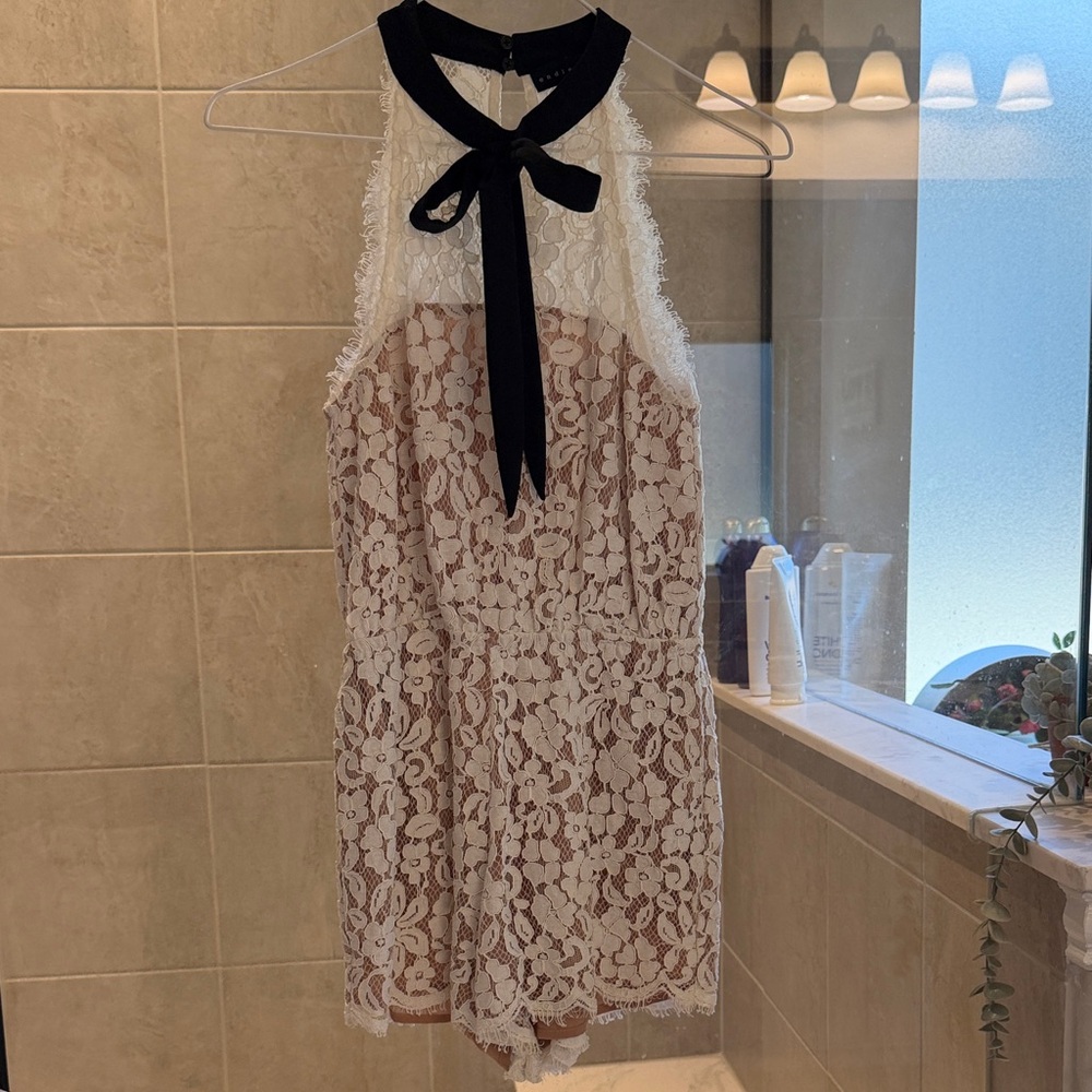 Endless Rose White Lace Backless Jumpsuit with Black Bow